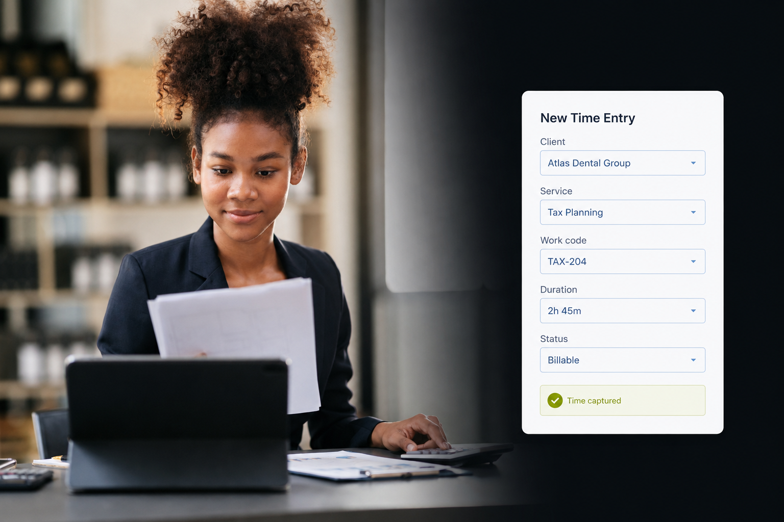 Accountant entering billable time in accounting time and billing software